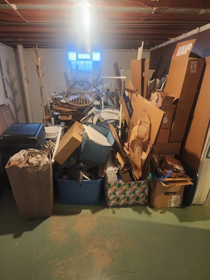 Roll-off dumpster container at job site for 8 Yard Dumpster Rental in Riverdale